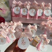 تصویر بانکه های شکلاتی بانکه شفاف با شکلات داخل و دیزاین صورتی ناز و پاپیون