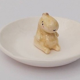 تصویر زیر سیگاری دایناسوری 