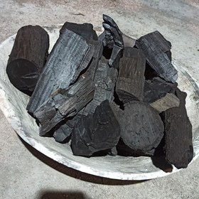 تصویر زغال ذغال کبابی کرکس با کیفیت عالی با چوب های گردو چنار گلابی مرکبات با وزن دلخواه شما هم به صورت عمده هم به صورت خرده 
