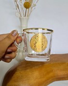 تصویر فنجان لب طلایی بلینک مکس مدل کار ورساچه 