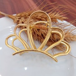 تصویر کلیپس فلزی طلایی صدف 