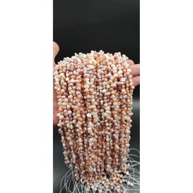 تصویر مروارید پرورشی سایز ۴-۵ میلی سوراخ از بغل کد 9875 