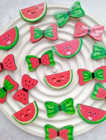 تصویر گیره انبری یلدایی - پاپیون سبز 