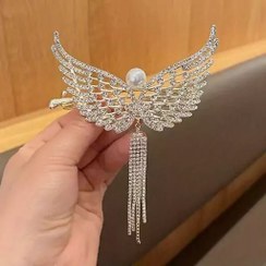 تصویر کلیپس مو زنانه مدل فلزی طرح بال فرشته آویزدار 