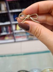 تصویر دکمه پاپیونی 