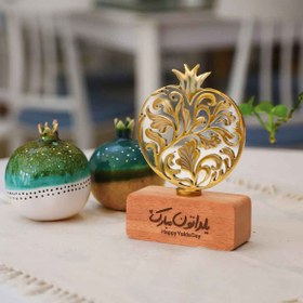 تصویر تندیس انار طلایی 