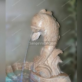 تصویر آبنما سنگی موج و ماهی 