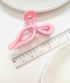 تصویر کلیپس مو طرح پاپیون 