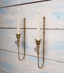 تصویر شمعدان دیوارکوب برنجی دست‌ساز مدل عصایی 