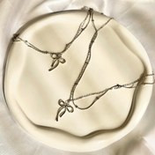 تصویر گردنبند و دستبند دولاین توپی 