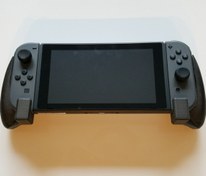 تصویر اتصال دسته بازی Nintendo Switch مدل OLED version 