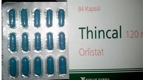 تصویر ونوستات چربی سوز تینکال ارلیستات تک ورق ۱۴عددی Thincal 120 mg (14 capsules) for weight loss, original