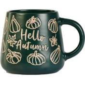 تصویر ماگ پاییزی فانتزی سرامیکی طرح کدو و برگ پاییزی رنگ سبز 