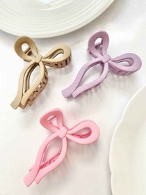 تصویر کلیپس مو طرح پاپیون 