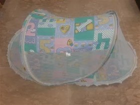 تصویر پشه بند نوزاد 