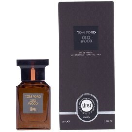 تصویر عطر جیبی مردانه و زنانه تاینی Oud Wood حجم 35 میل النترا تاینی Elentra Tiny Oud Wood Parfum For Unisex 35ml