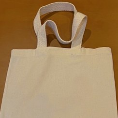 تصویر 1 عدد توتبگ خام سفید رنگ متقال ضخیم با دسته پنبه‌ای 