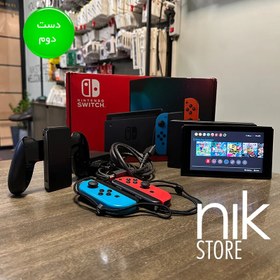 تصویر نینتندو سوییچ اولد جوی کان قرمز/آبی (کارکرده) به همراه ۷ عدد بازی اورجینال Nintendo Switch OLED with Neon Blue and Neon Red Joy-Co