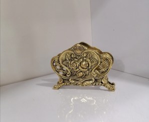 تصویر جادستمال کاغذی کنار سینی برنز Paper napkin holder next to the bronze tray