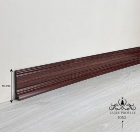 تصویر قرنیز گردویی تیره طرح چوب پی وی سی 10cm کد 1052 