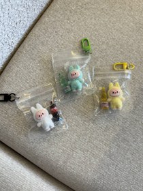 تصویر عروسک آویز لبوبو نوشابه ای رنگی - سفید Colorful soft drink lollipop hanging doll