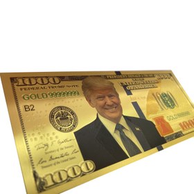 تصویر اسکناس 1000 دلار آمریکا طرح دونالد ترامپ روکش آب طلا 
