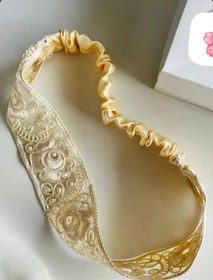 تصویر هدبند طرح گل مرواریدی 