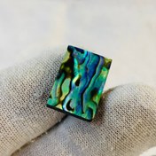 تصویر نگین صدف رنگين كمانى آبالون طبيعى سایز 18*13 ميلی‌متر 