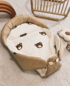 تصویر قنداق سوییسی تدی آغوشی 