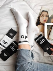 تصویر جوراب نخی ساق بلند زنانه الو 