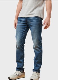 تصویر جین‌های جذب با رنگ آبی روشن فِلکس برند american eagle Flex Light Wash Slim Fit Jeans