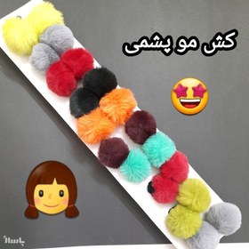 تصویر کش مو پوم پوم - کد 2174069 