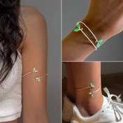 تصویر دستبند بنگل استیل طرح جوانه و برگ ها با رزین 