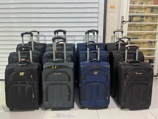 تصویر چمدان برزنتی در رنگبندی متنوع در سه سایز موجود chamadan