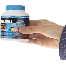 تصویر غذای ماهی فلوال وزن 90 گرم FLUVAL tropical sinking pellets