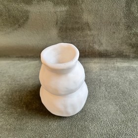 تصویر گلدان دکوری فنری دفرمه 