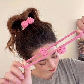 تصویر کش مو گره ای رنگی 