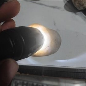 تصویر یاقوت بی رنگ زیبا 100گرمی 