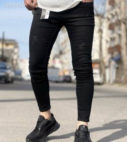 تصویر شلوار جین مشکی پرکلاغی پارچه فول کش اسکینی جذب Full-cache ice-free jeans