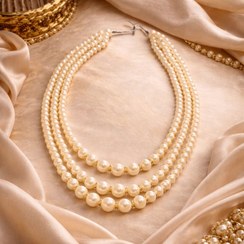 تصویر پرده جمع کن مدل مروارید سه رشته نگین دار 