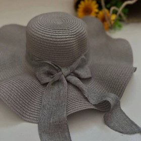 تصویر کلاه حصیری زنانه موجدار پاپیون کنفی 