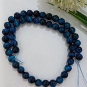 تصویر سنگ گرد چشم ببر آبی سایز 8(فروش بصورت ریسه ای) 