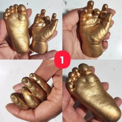 تصویر تندیس دست و پای کودک آماده همراه با یک بسته رنگ طلایی 