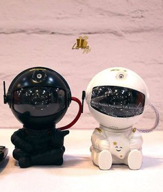 تصویر رقص نور کهکشانی فضانورد کوچک 