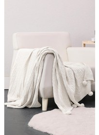 تصویر پتو تلویزیونی بافتنی بایوکاتن با پوم‌پوم - کرم برند favora Biocotton Knitwear Pompom TV Blanket - Cream