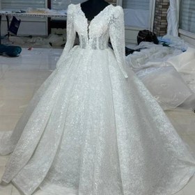 تصویر لباس عروس دو کلوش با پارچه تمام کار شده دانتل فرانسه Bride dress