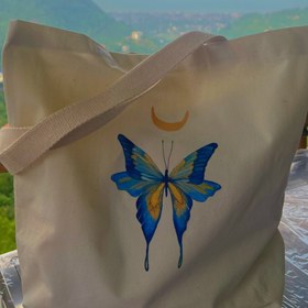 تصویر توتبگ پروانه آبی 