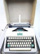 تصویر ماشین تایپ المپیا فارسی نویس آلمانی فلزی 