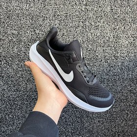 تصویر کتانی زنانه نایکی مدل 963 با رویه بافت و زیره نرم 