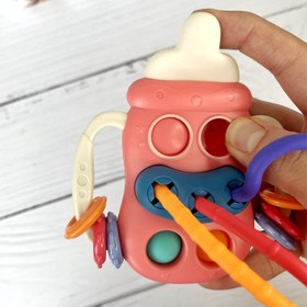 تصویر اسباب بازی بیزی بال طرح شیشه شیر مناسب نوزاد 